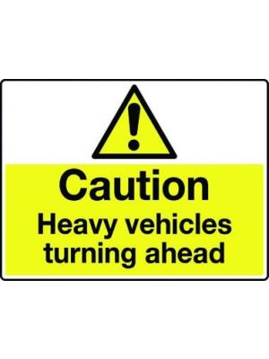 Caution Heavy vehicles turning ahead sign Image